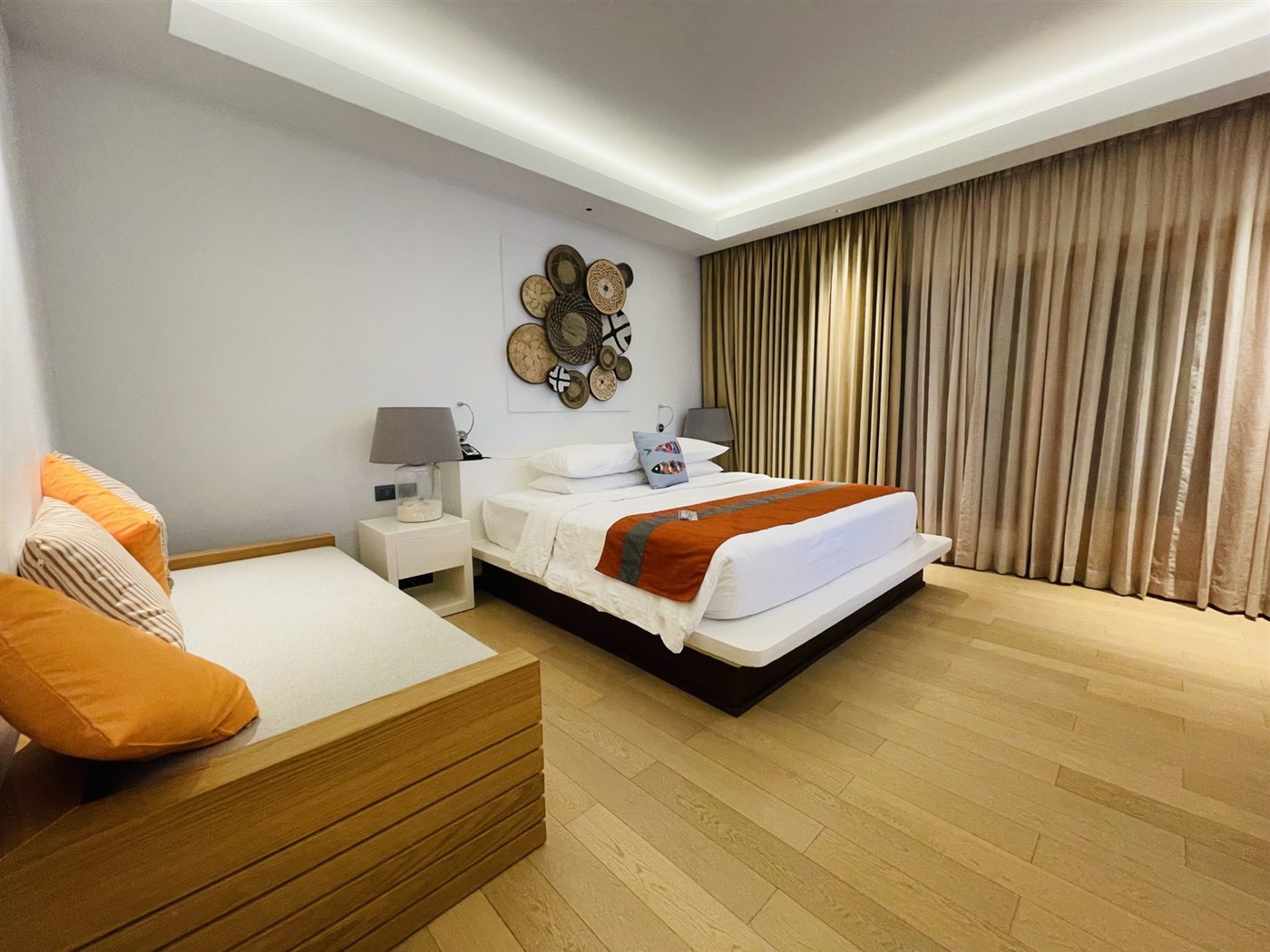 Layered bedding with warm light and visible woven texture