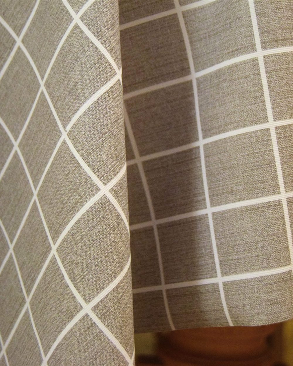 Close textile detail with patterned surface and soft folds
